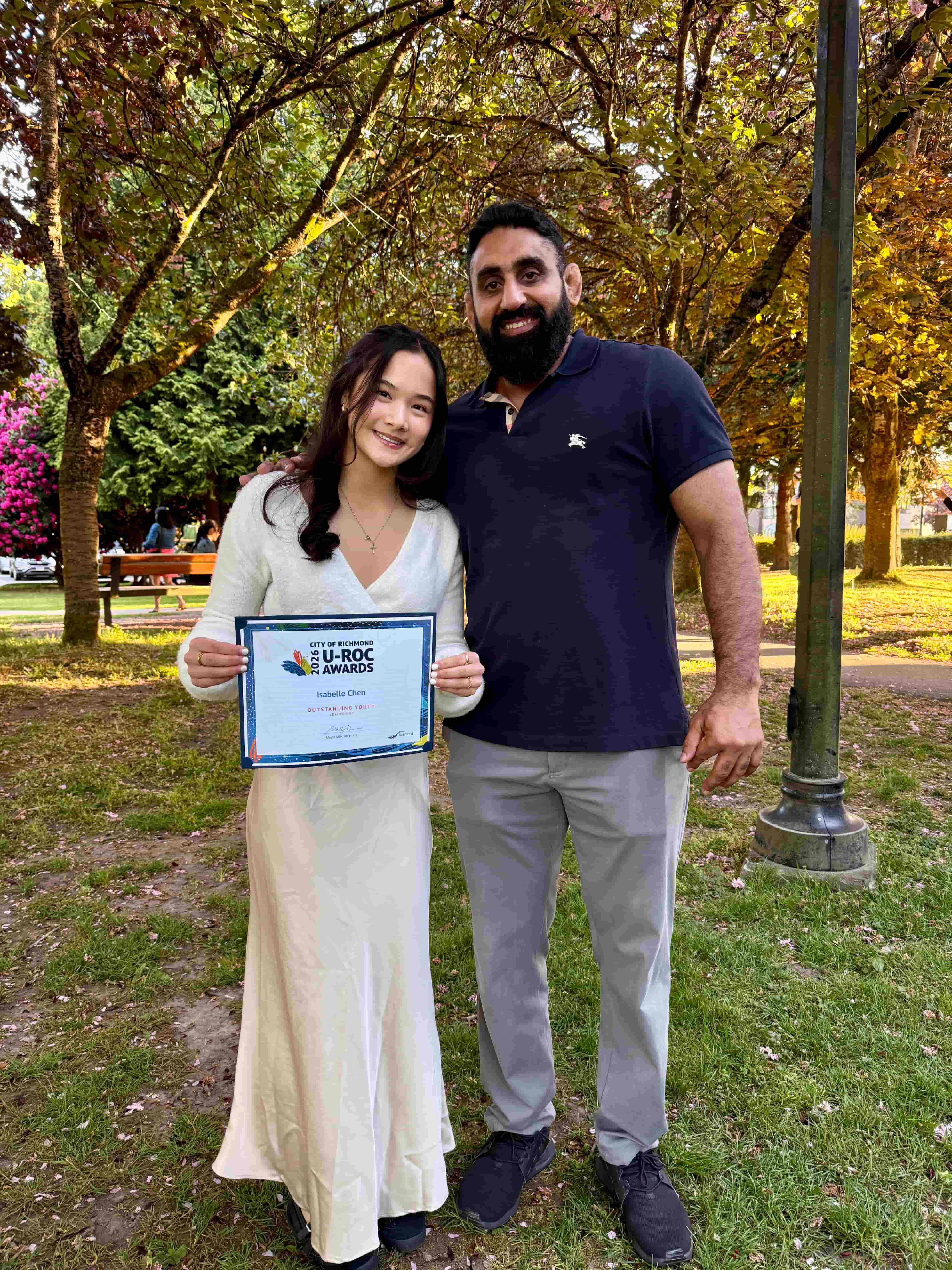 Isabelle receiving the U-ROC Youth Leadership Award
